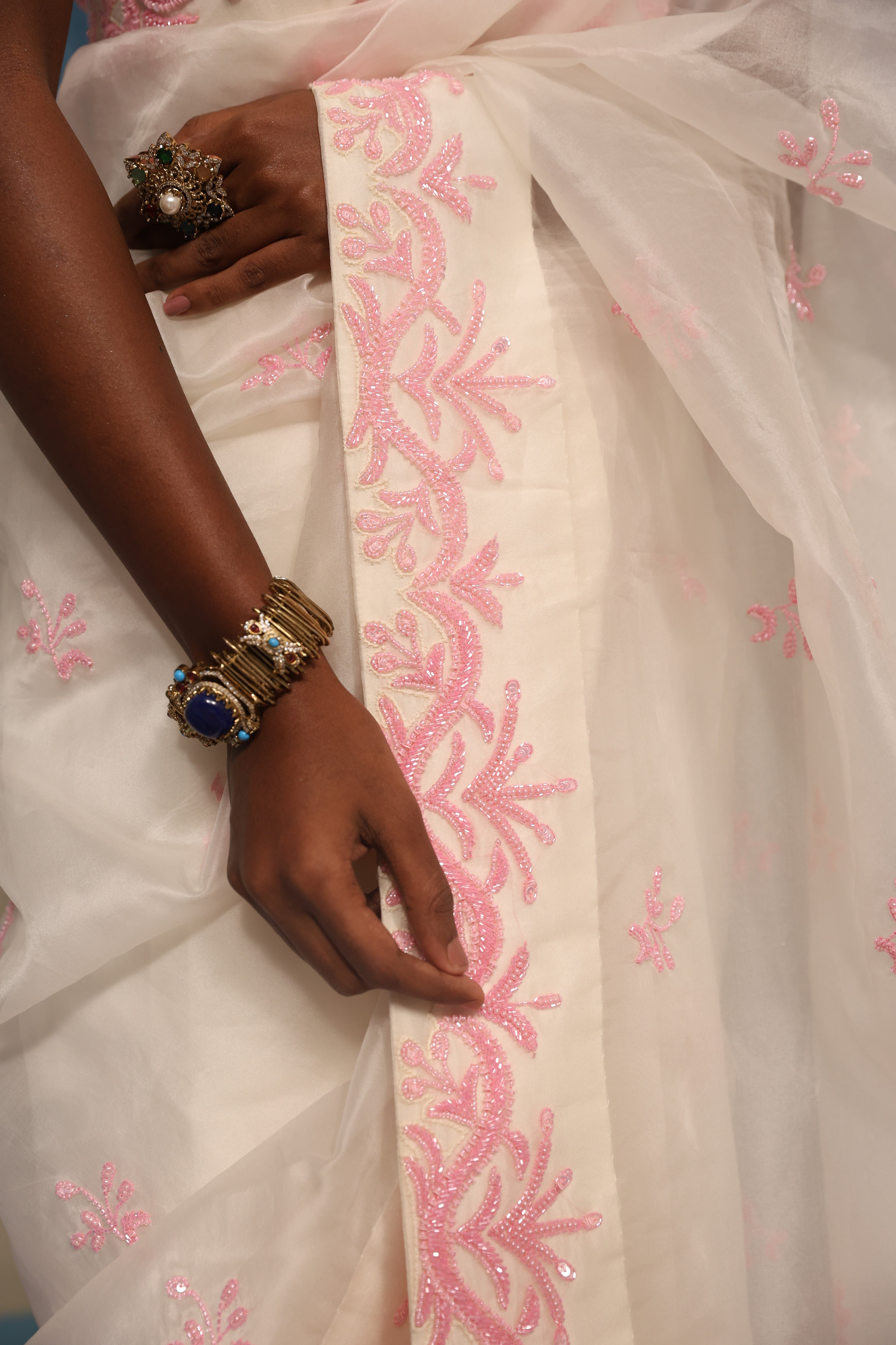 Off-White Crop Top Paired with a Classic Saree